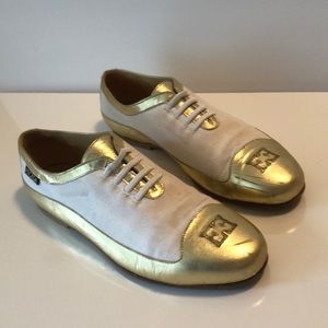 Escalated canvas and gold shoes